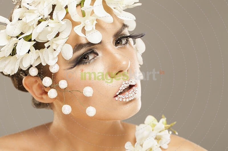 woman covered with white flowers