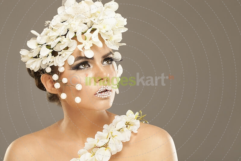 woman covered with white flowers