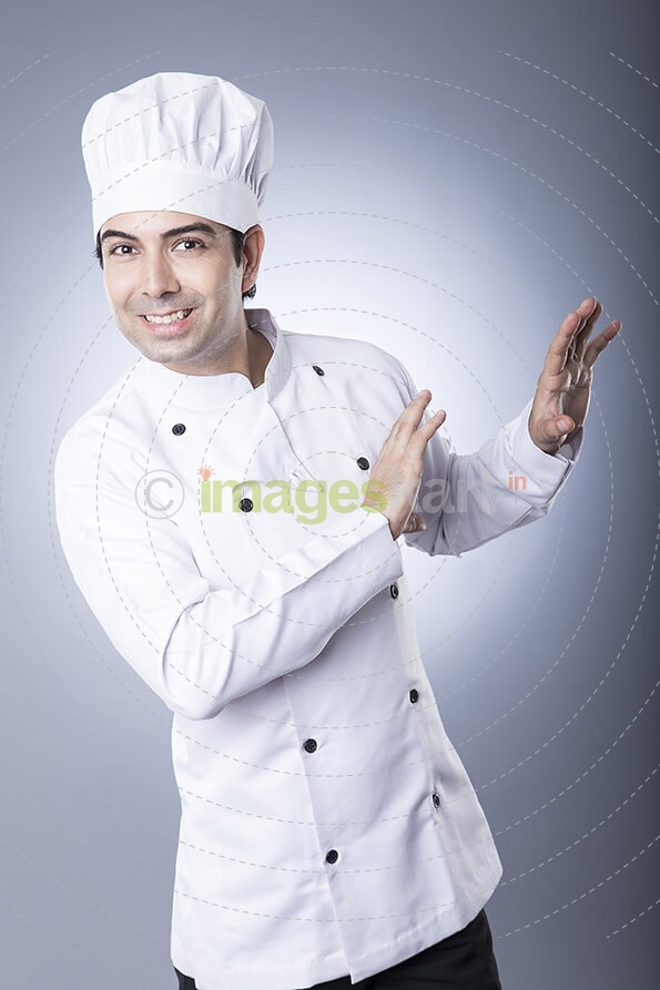 chef smiling and posing 