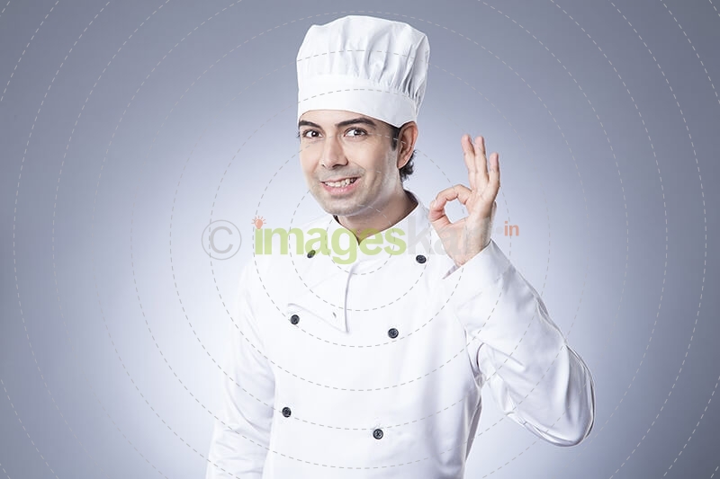 chef smiling and posing 