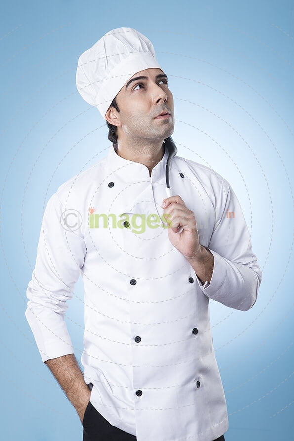 chef thinking with spatula in hand