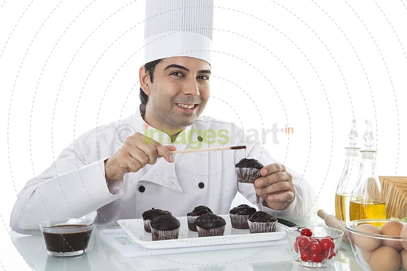 chef making cupcakes 