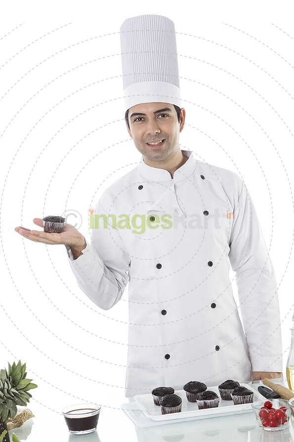 chef with cupcakes