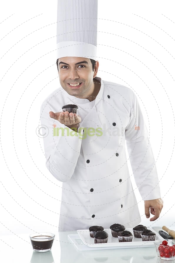 chef with cupcakes
