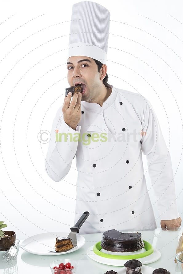 chef with cake and muffins 