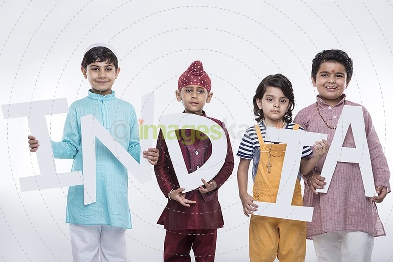 kids posing with alphabets
