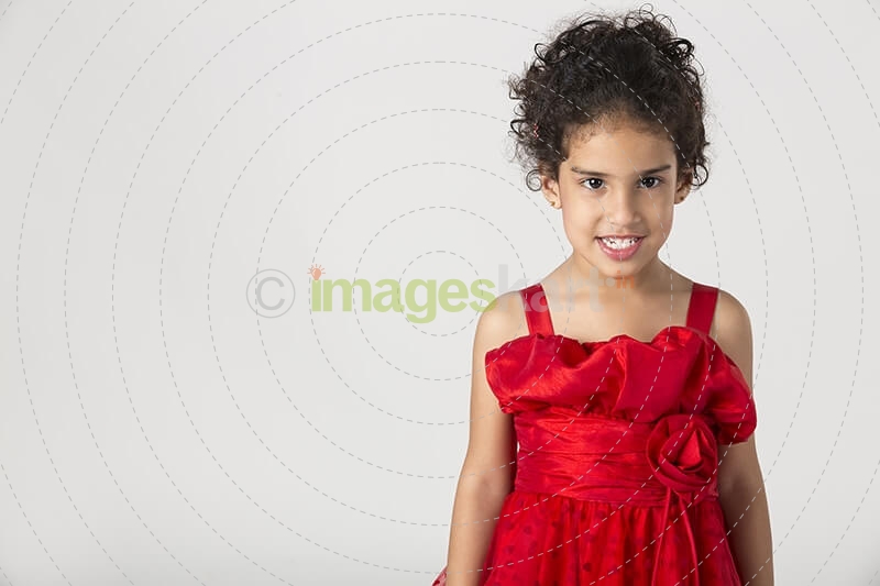 girl wearing red dress gesturing