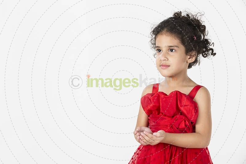 girl wearing red dress gesturing