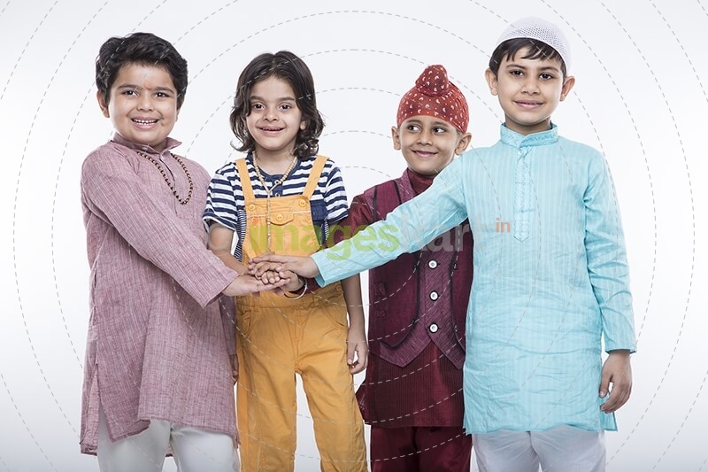 kids from different religions standing together 