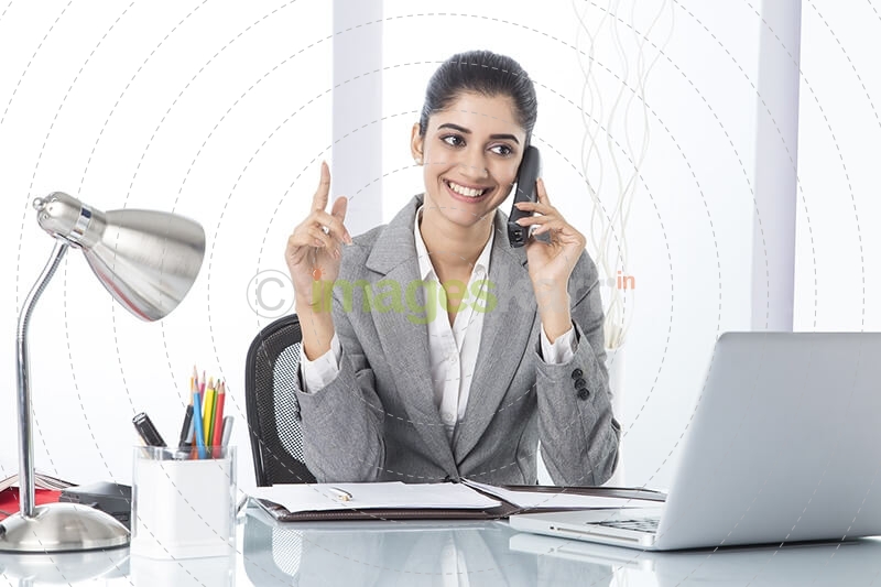 corporate woman talking while working 
