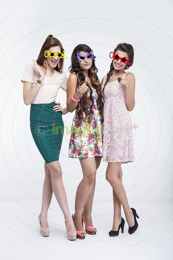 stylish girls wearing colourful sunglasses 