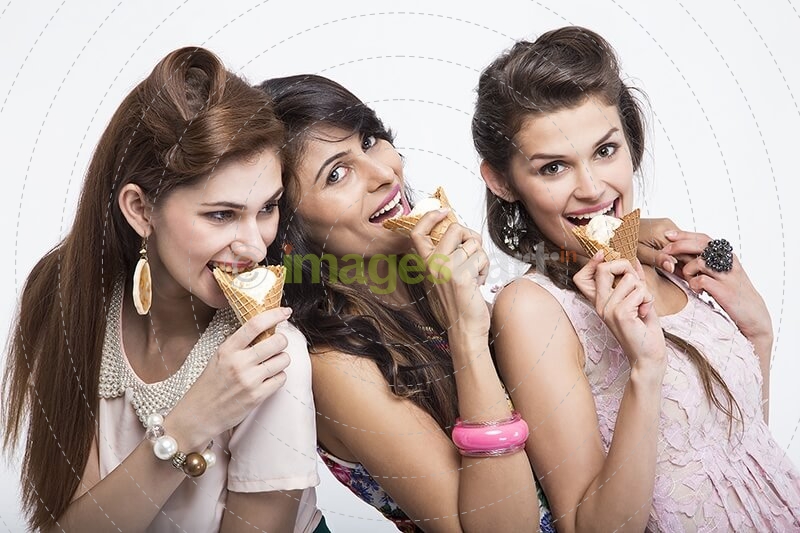 three girls eating ice cream