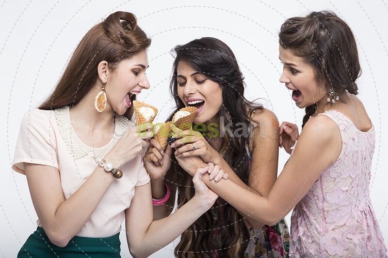 three girls eating ice cream