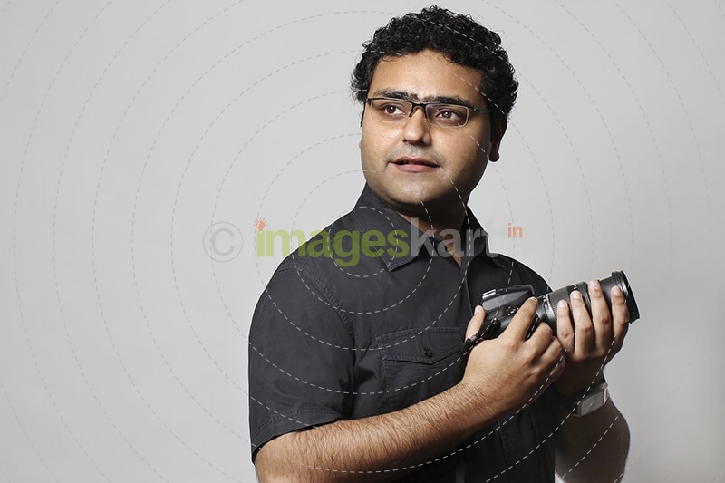 professional photographer with dslr camera
