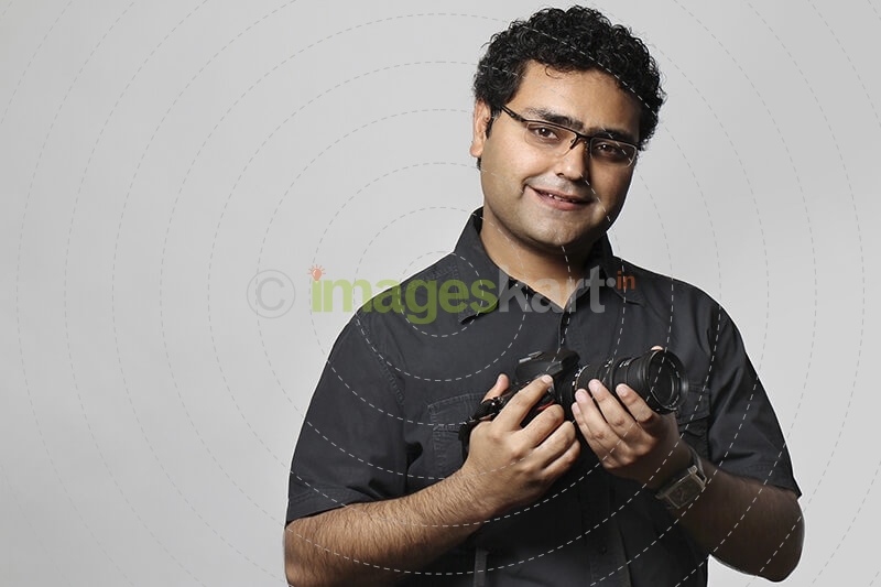 professional photographer with dslr camera