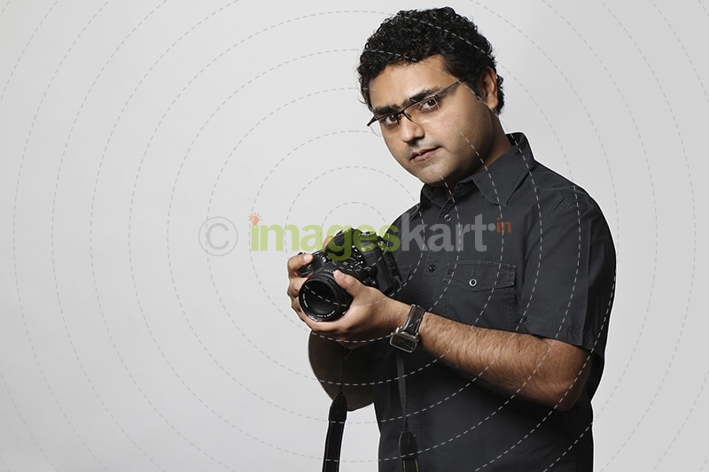professional photographer with dslr camera