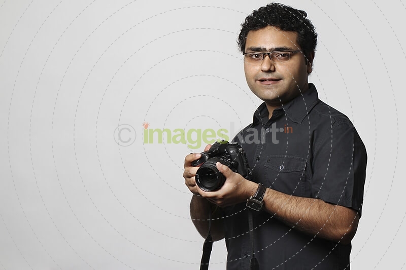 professional photographer with dslr camera
