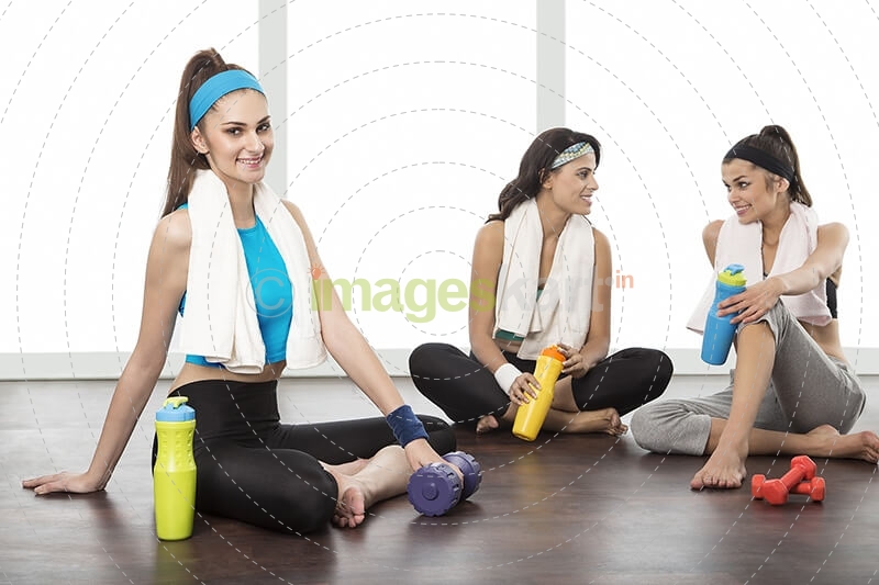 girls stretching in gym