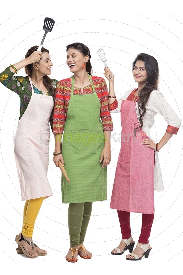 women wearing apron with kitchen utensils
