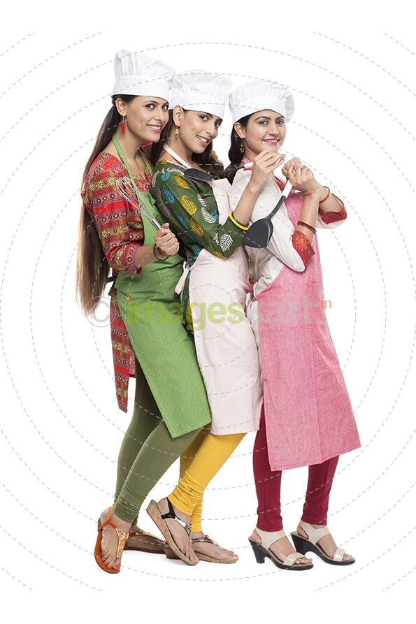 women wearing apron with kitchen utensils
