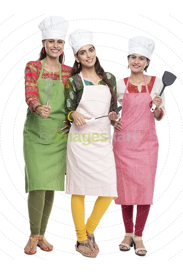 women wearing apron with kitchen utensils