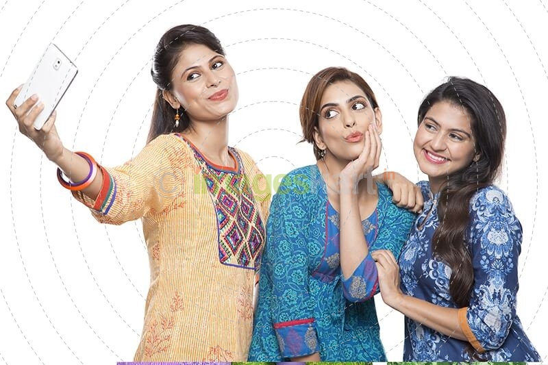 Three women taking selfie on phone