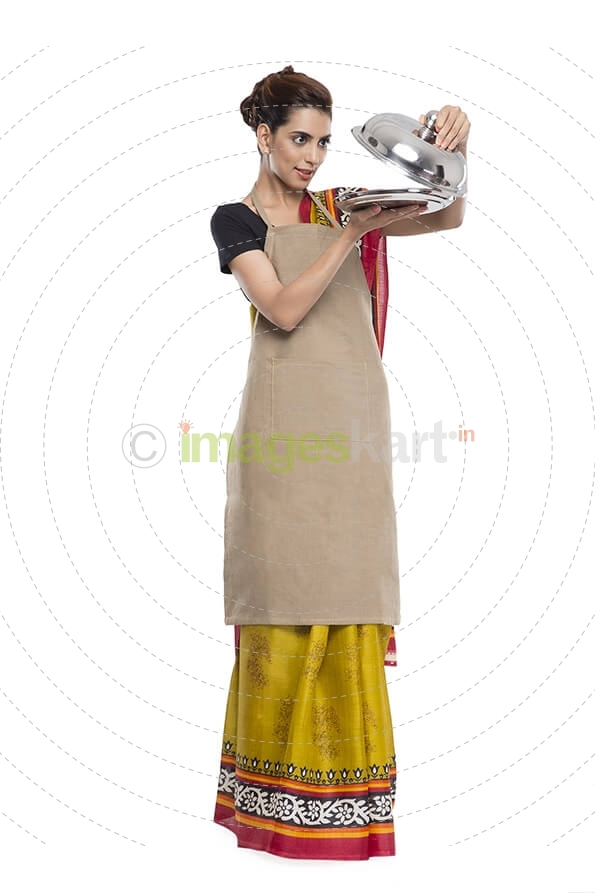 women wearing apron with kitchen utensils