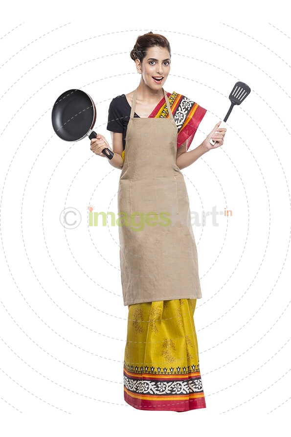 women wearing apron with kitchen utensils