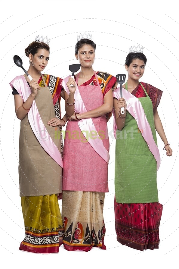 women wearing apron with kitchen utensils