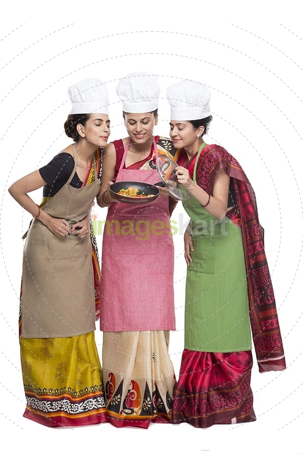 three women with fry pan