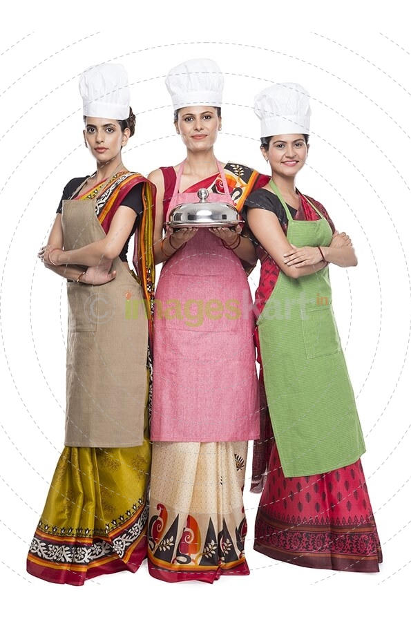 chef wearing apron with kitchen utensils