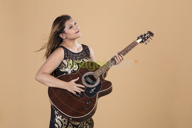 Girl playing guitar