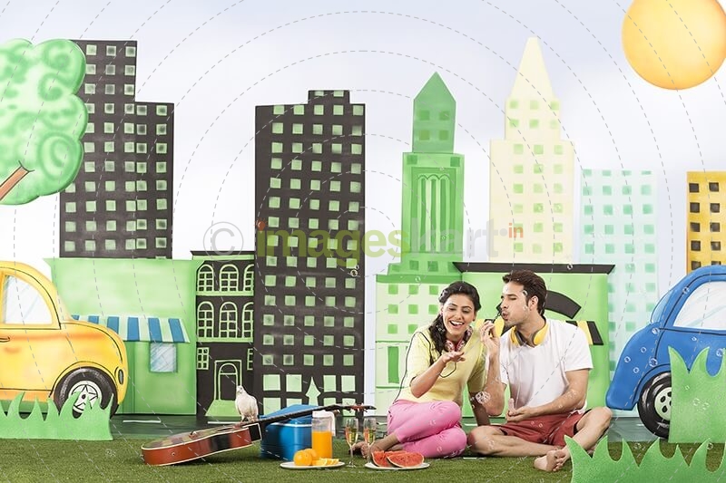 Couple playing with bubbles