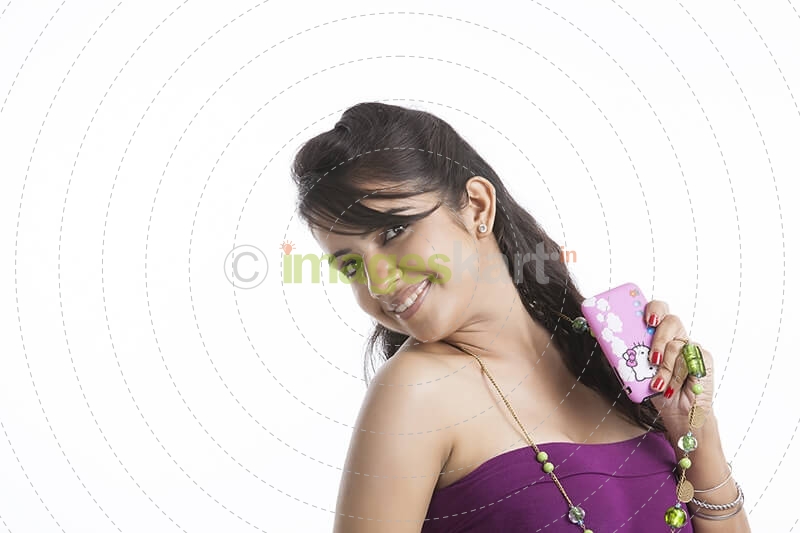 teen girl holding mobile