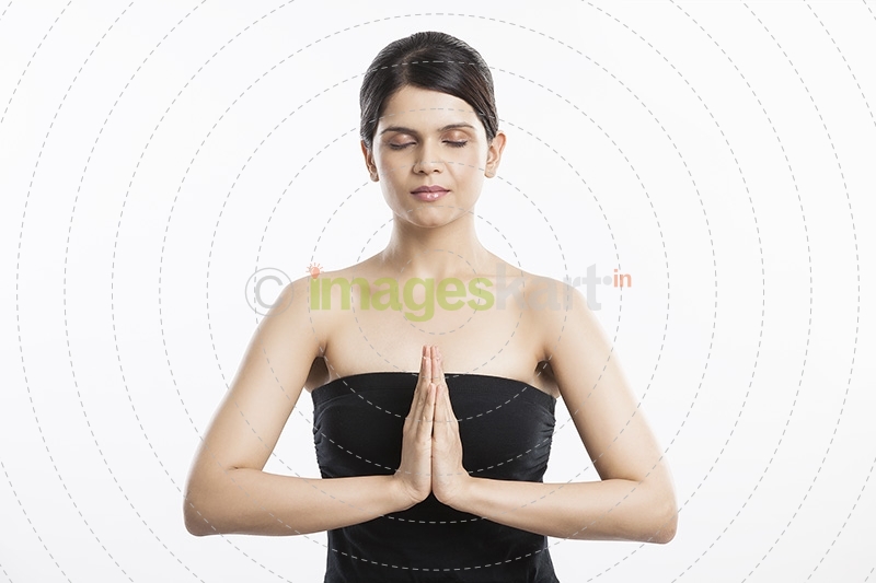 young woman doing yoga exercise