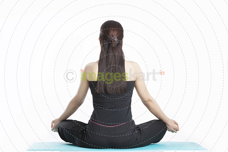  girl sitting in meditation