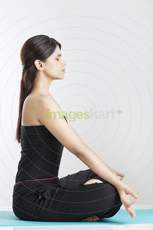 girl sitting in meditation