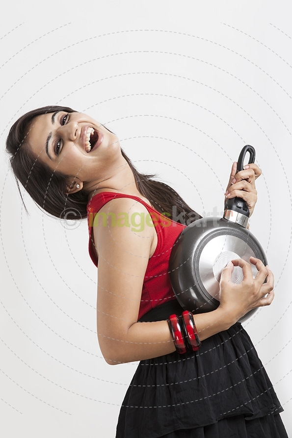Girl playing Guitar with pan