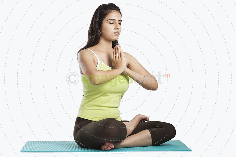 girl sitting in yoga pose