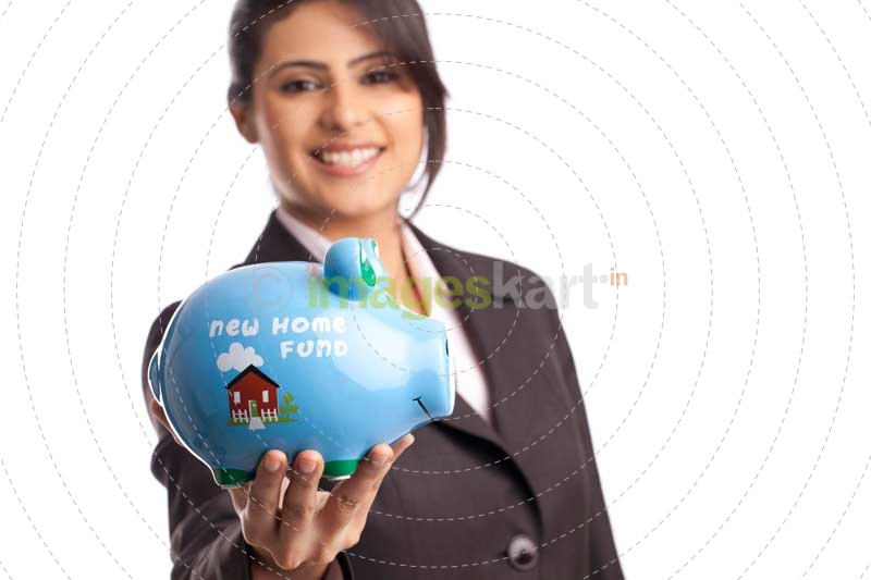 girl with new home fund piggy bank