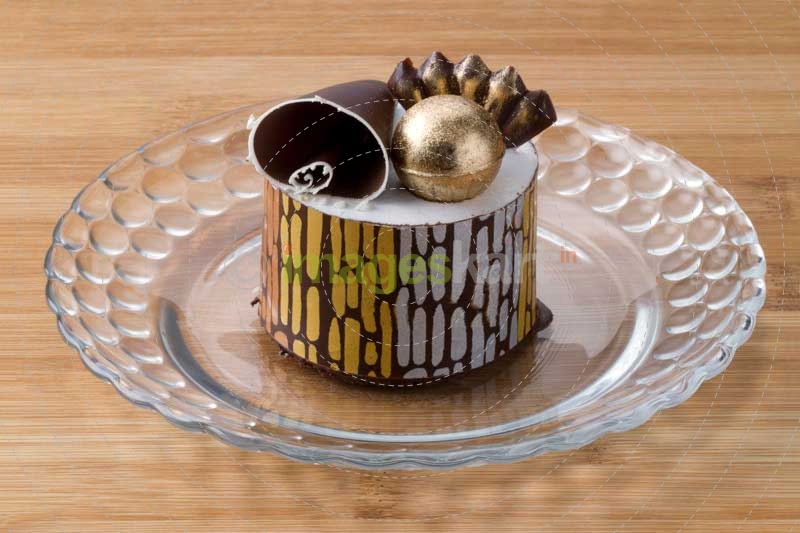 chocolate desert with gold decoration