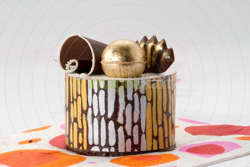 serving desert with edible gold ornaments
