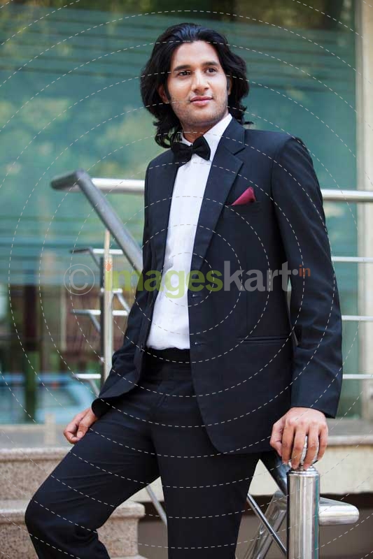 guy with long hair in suit