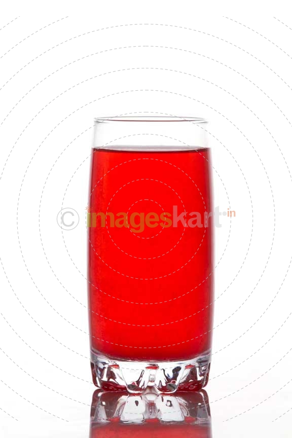 red coloured soda drink
