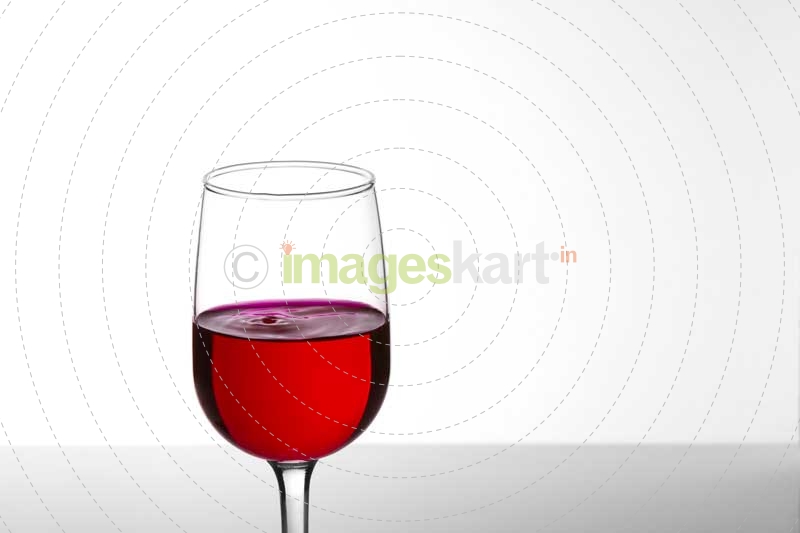 a glass of red wine with copy space for advertising purposes