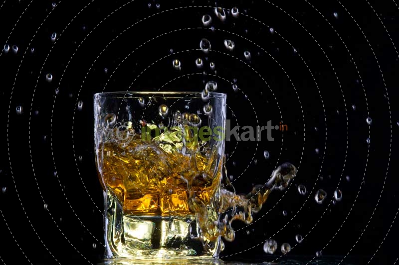 whiskey splashing from a glass
