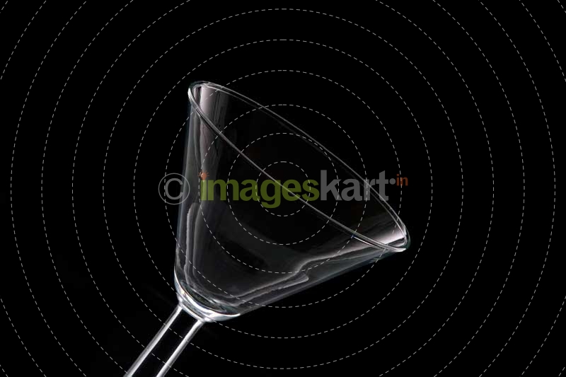 empty cocktail glass on a dark background