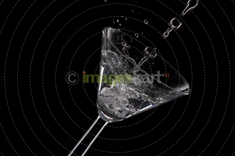cocktail splash against a dark background