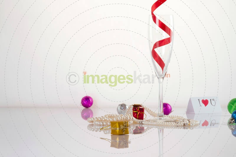 gifts and champagne glass with a love note