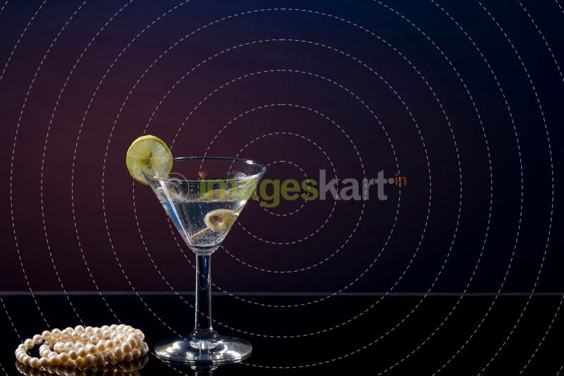 drink with olive garnish